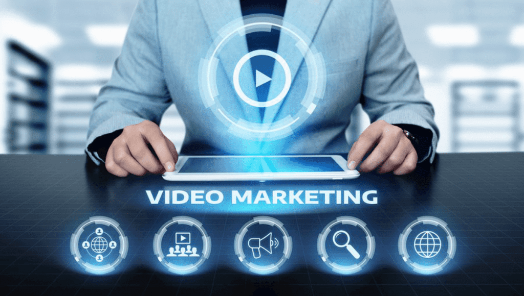 Person calculating real estate video marketing stats